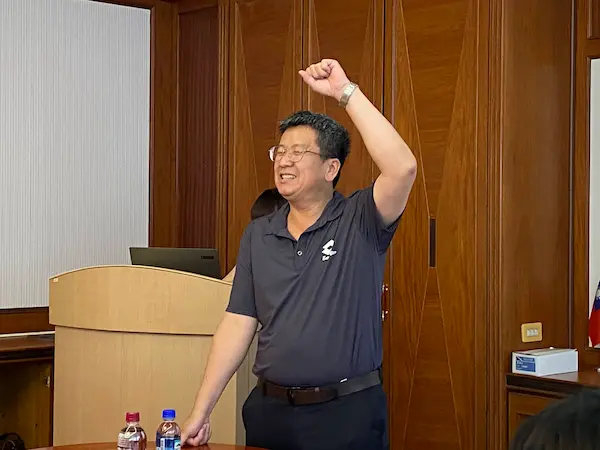 Manager explaining the company's future vision and strategy during the meeting